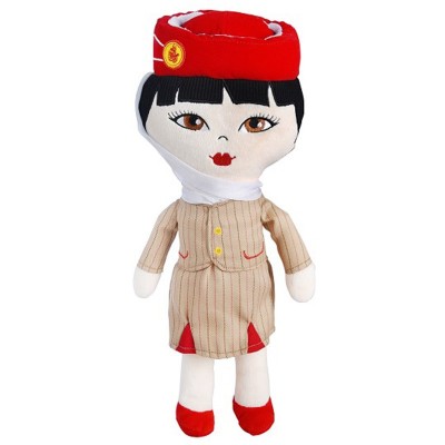 Boneco de piloto com logotipo da Emirates