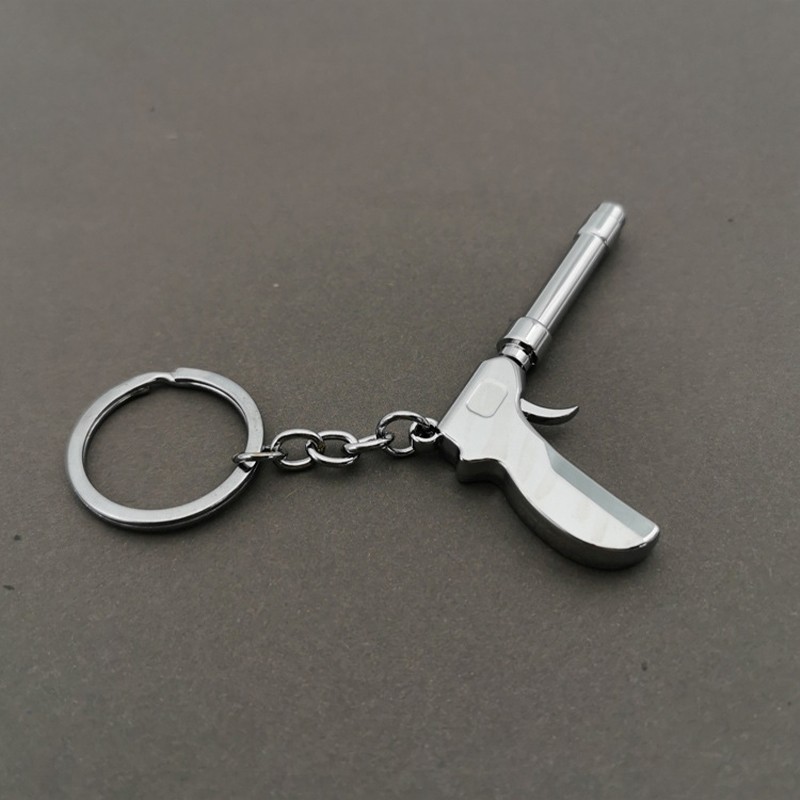 Chaveiro de Metal em Forma de Arma