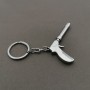 Chaveiro de Metal em Forma de Arma